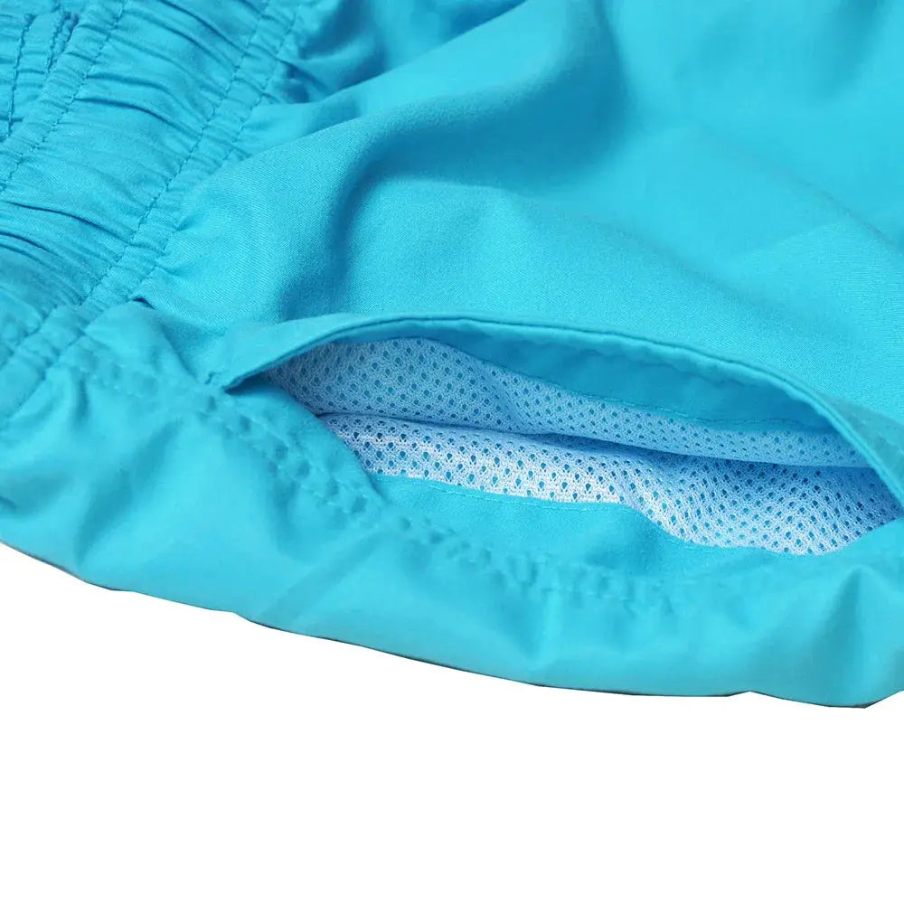 Simples Market turquoise swim trunks with quick-dry fabric and breathable mesh lining