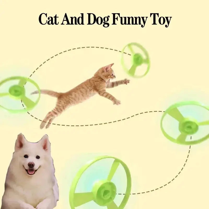 Funny Cat Toy interactive launch toy with neon-green propeller discs; a kitten leaps mid-air chasing flying discs