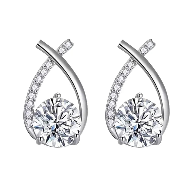 Simples Market SKEDS cross-style crystal stud earrings, silver-tone with pave crystals, pair