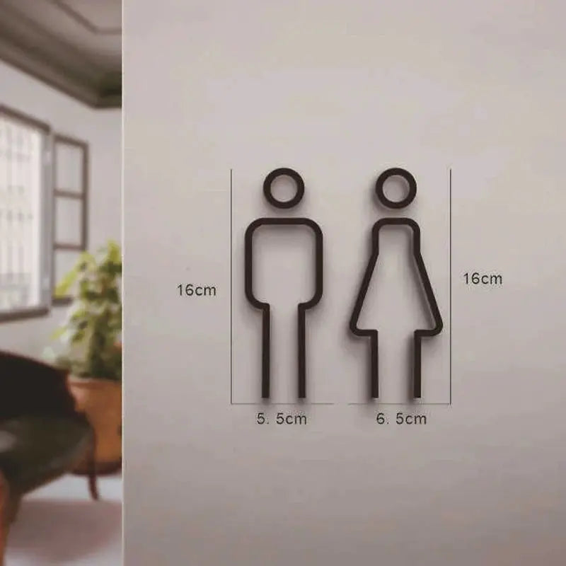 Bathroom signs by Simples Market; black metal 2D man and woman silhouettes for restroom door decor