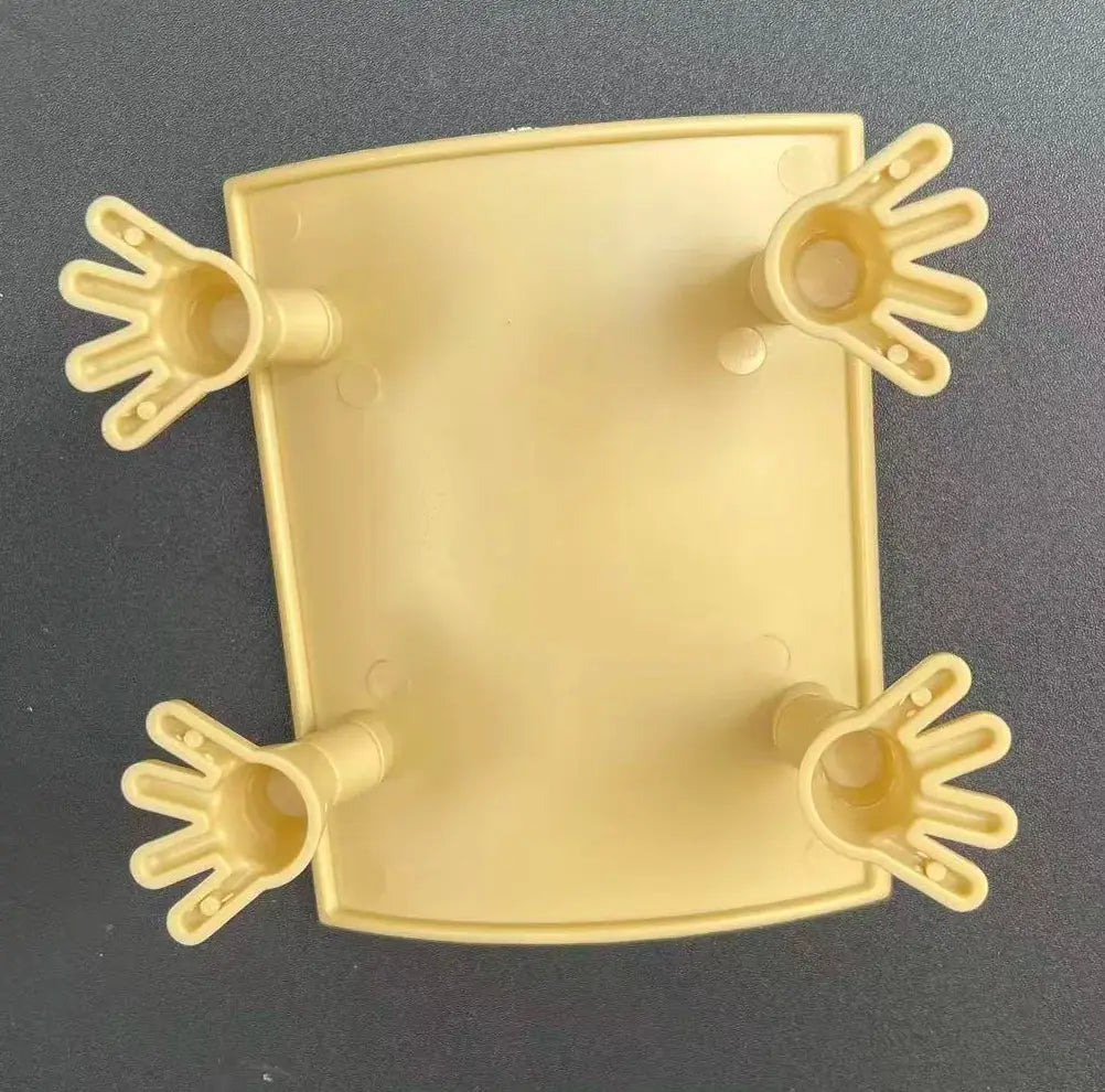 Yellow plastic toilet paper holder with four hand-shaped clips for bathrooms