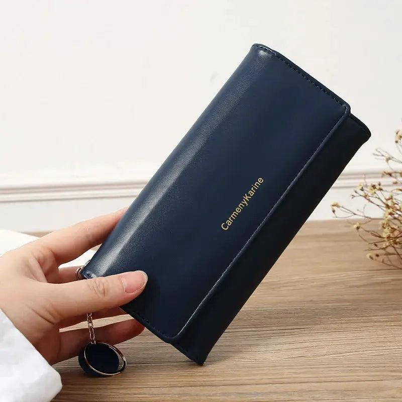Long PU leather wallet in navy blue with gold Carmenykarine logo, fold-style purse and attached key ring