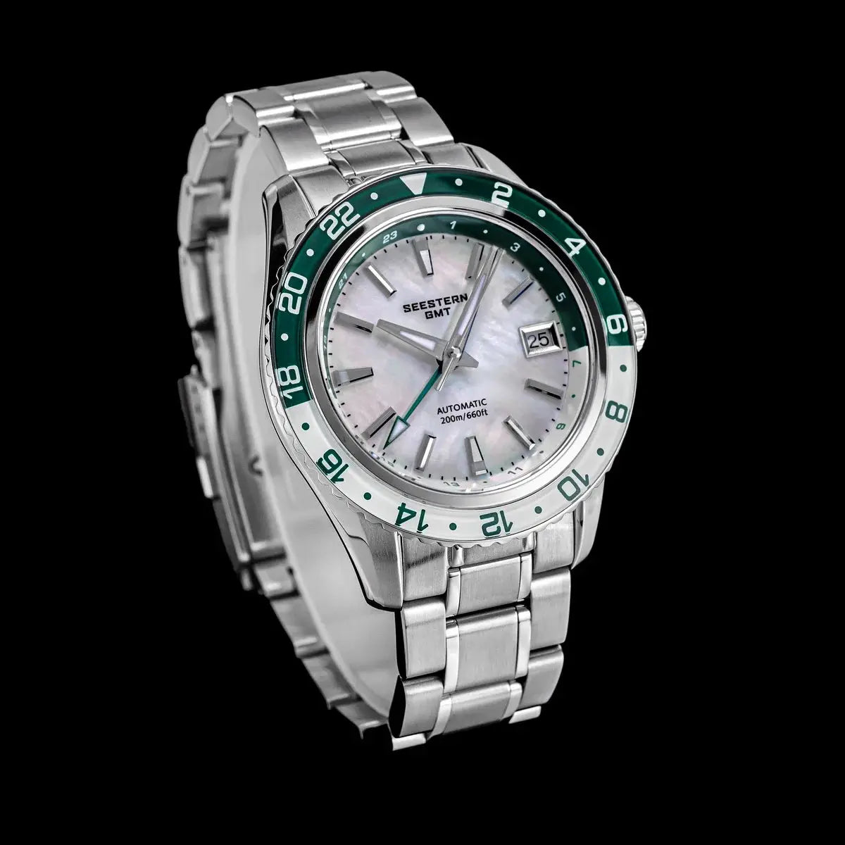 SEESTERN men's GMT automatic stainless steel wristwatch with green 24h bezel and mother-of-pearl dial