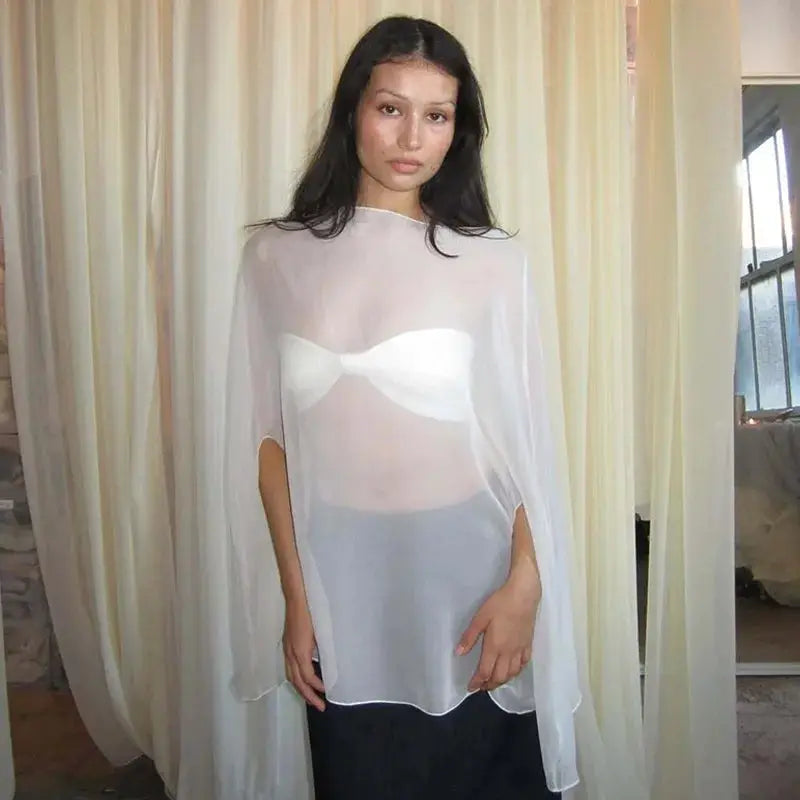 Women's white sheer chiffon blouse cover-up; see-through top over a white bra by Simples Market