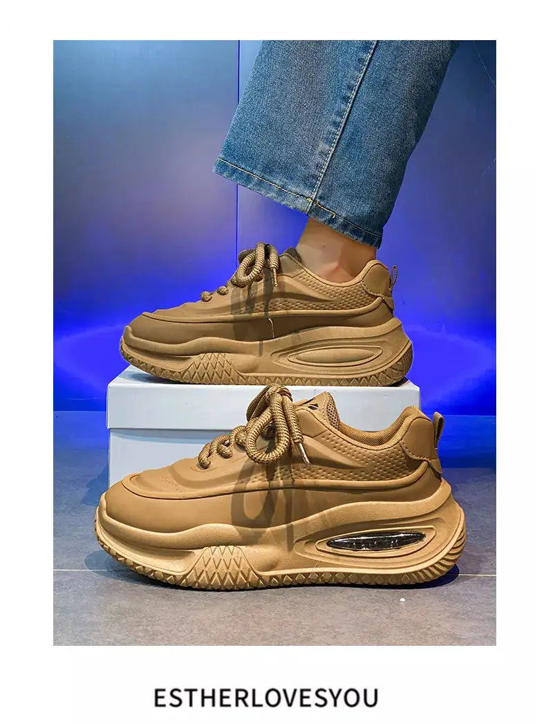 Pair of men's casual sports shoes in tan brown with a thick skateboarding-inspired sole