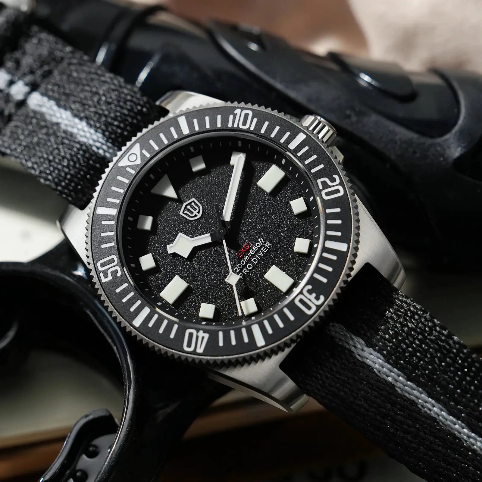 Watchdives EXD 40mm titanium dive watch; black dial with luminous markers, rotating bezel, on black fabric strap