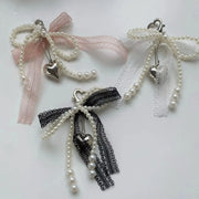 Pearl bead keychain with heart charm and lace bowknot ribbons in pink, white and black