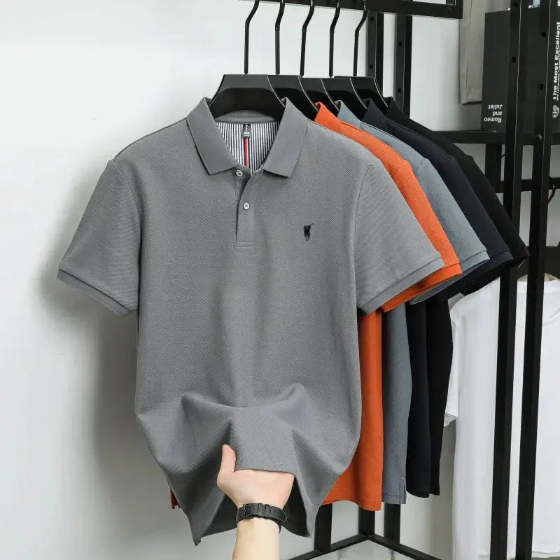 Polo shirts on rack: six colors, front gray short-sleeve polo with small chest embroidery