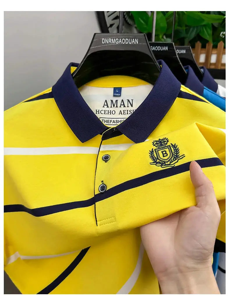 Men's yellow striped polo shirt with navy collar and chest crest embroidery; breathable short-sleeve business casual