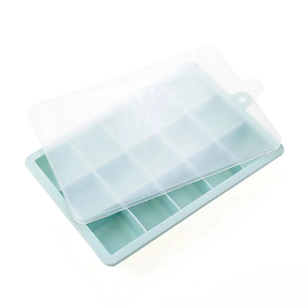 Silicone ice cube mold with clear lid, 24-grid square tray in light blue by Simples Market