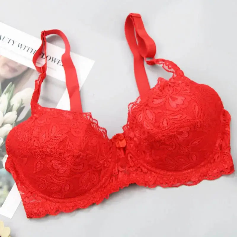 Red lace bra with floral pattern and adjustable straps