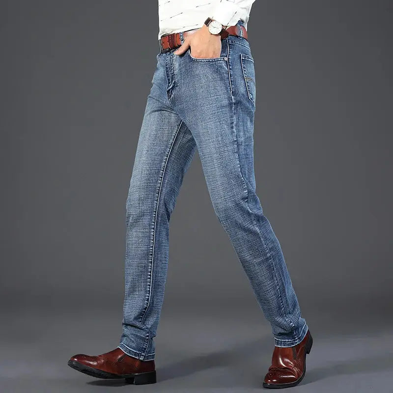 Men's blue denim jeans with straight-leg fit and stretch, casual work trousers