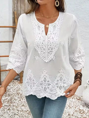 White embroidered lace blouse with long sleeves and scalloped hem, casual boho top for weekend wear