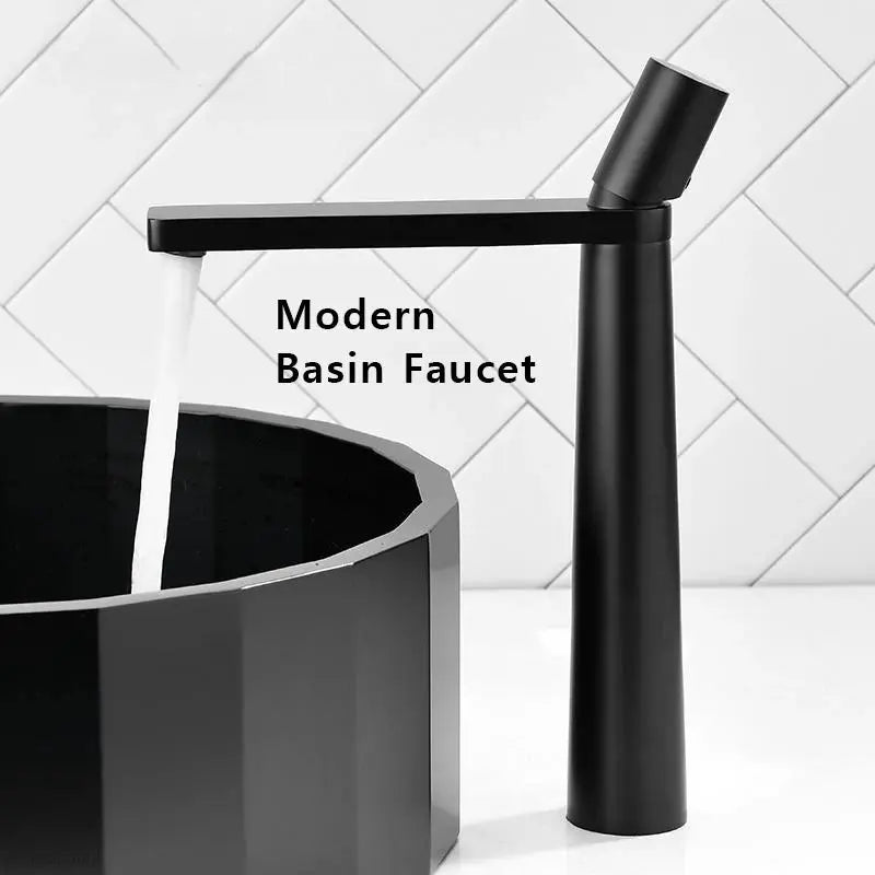 Modern basin faucet with black matte finish, single-handle design for grey washbasin.