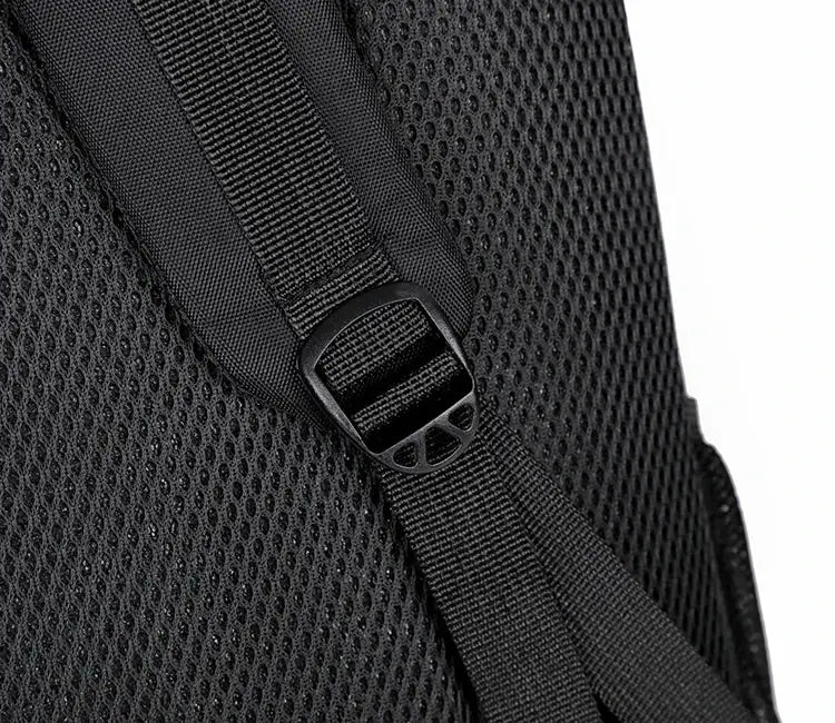 Backpack with black fabric, breathable mesh back panel, and adjustable strap