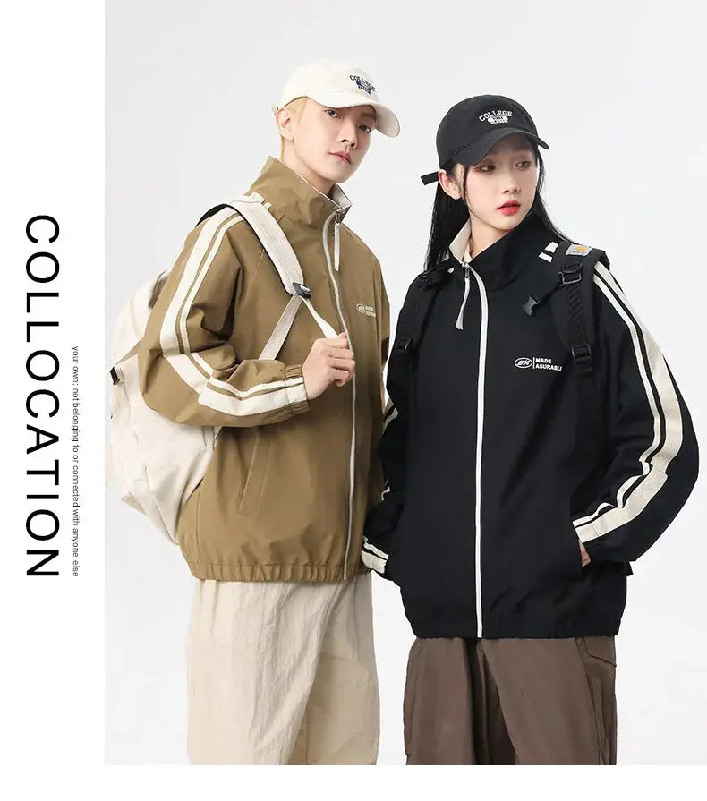 Two-sided reversible windproof jackets by Simples Market for men and women; tan and black with white stripes.