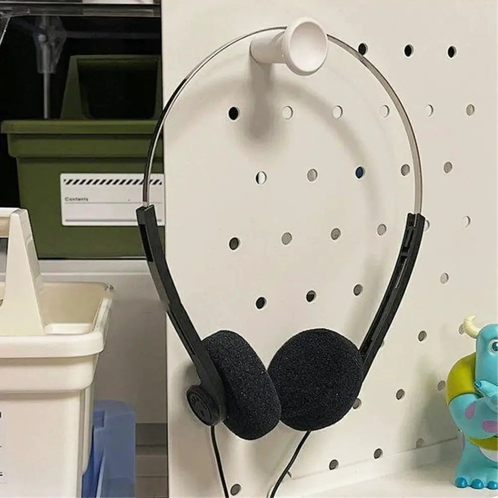 On-ear wired stereo headphones, black foam ear cushions, adjustable headband, 3.5mm plug