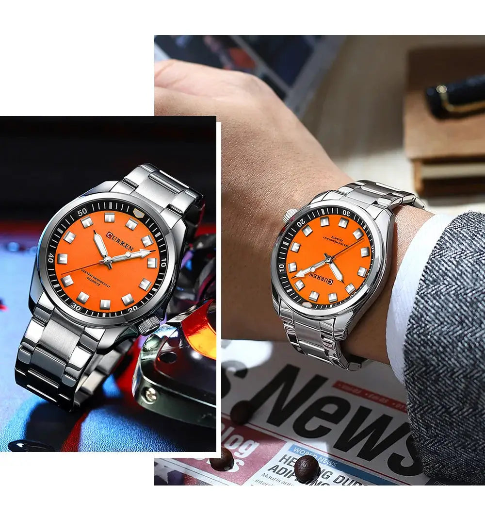 Two CURREN 8451 men's stainless steel wristwatches with orange dials