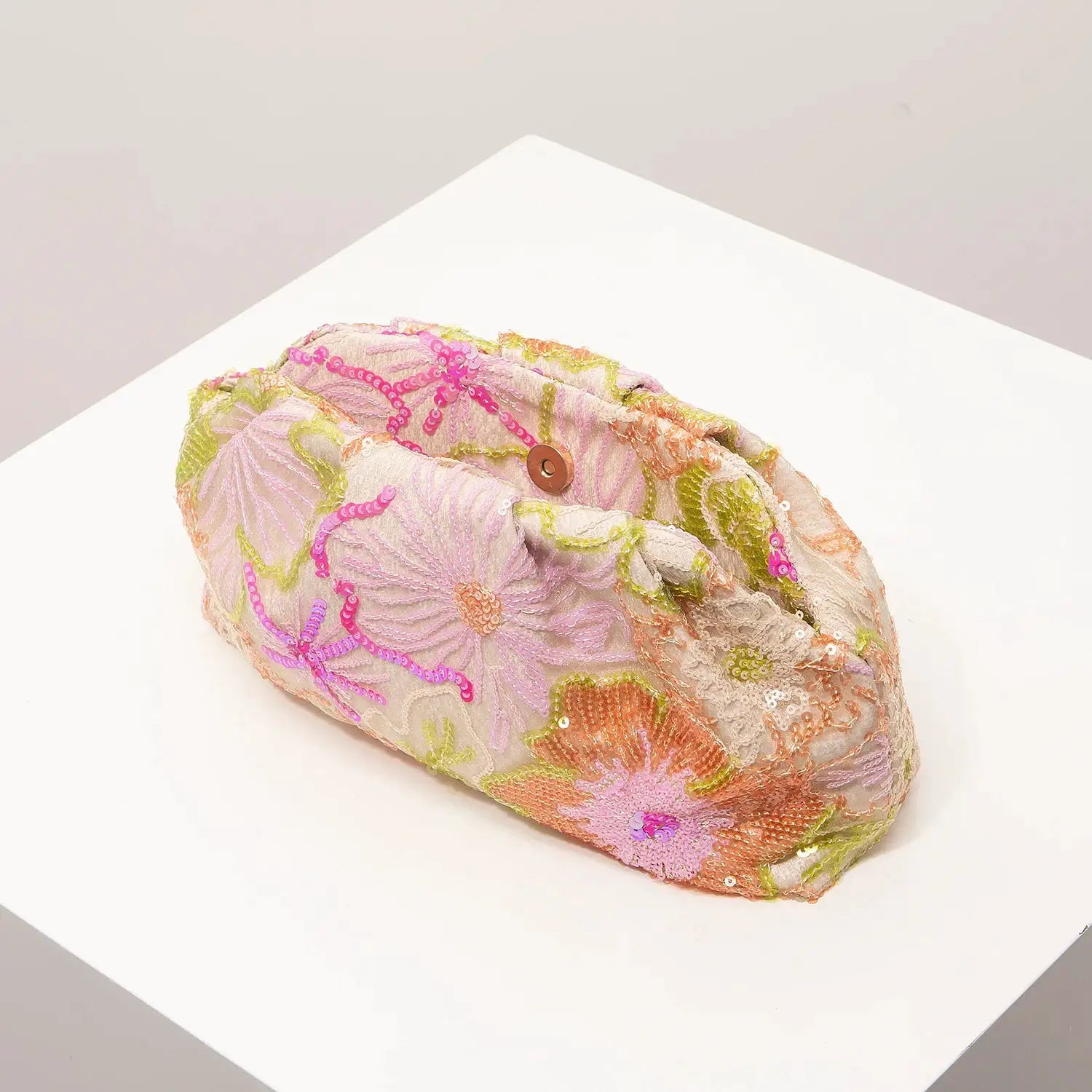 Clutch bag with pastel floral embroidery and pink sequins, gold metal clasp