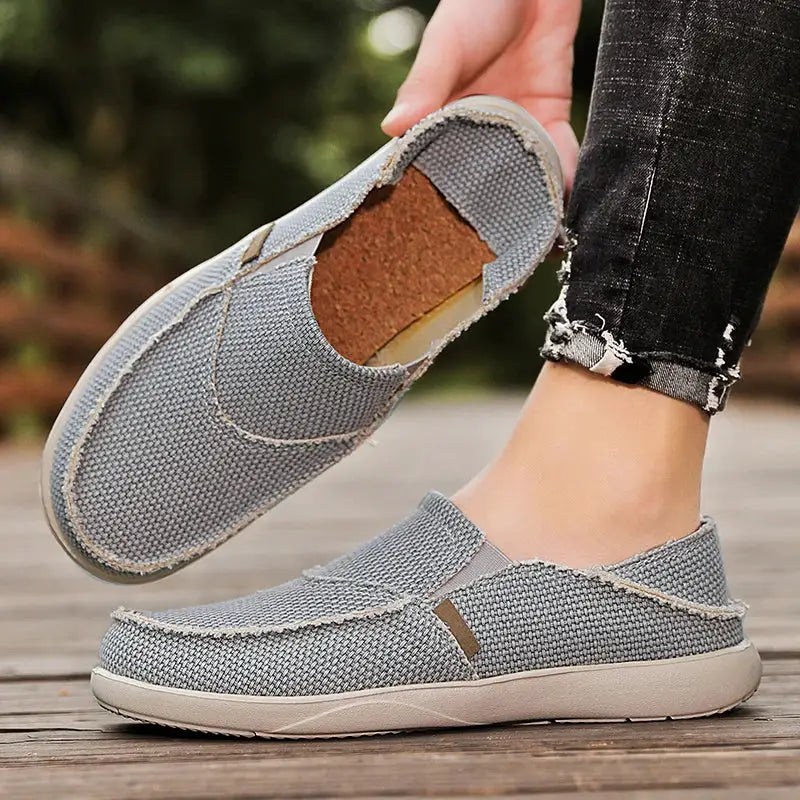 Men's light grey canvas slip-on loafers by Simples Market with beige sole