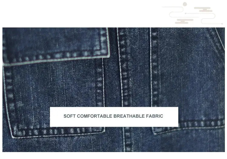 Women's blue denim overalls close-up with front pockets and visible stitching