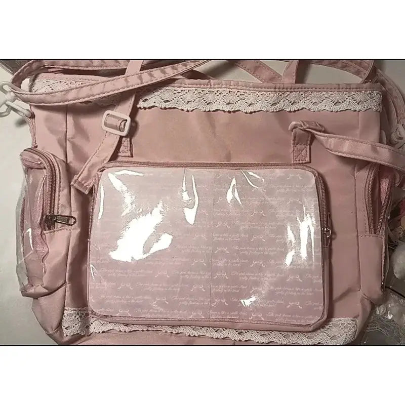 Ballet Girl large appetite itabag pink crossbody bag with lace trim and clear front pocket by Simples Market
