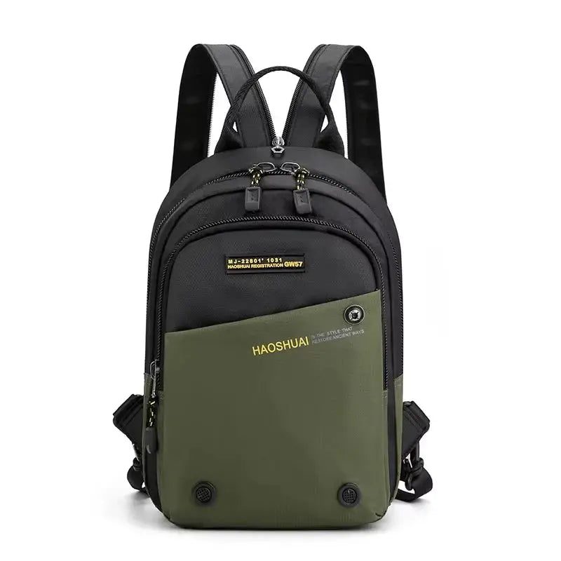 Men's small nylon backpack with green front pocket and black body, military-style daypack with dual zippers