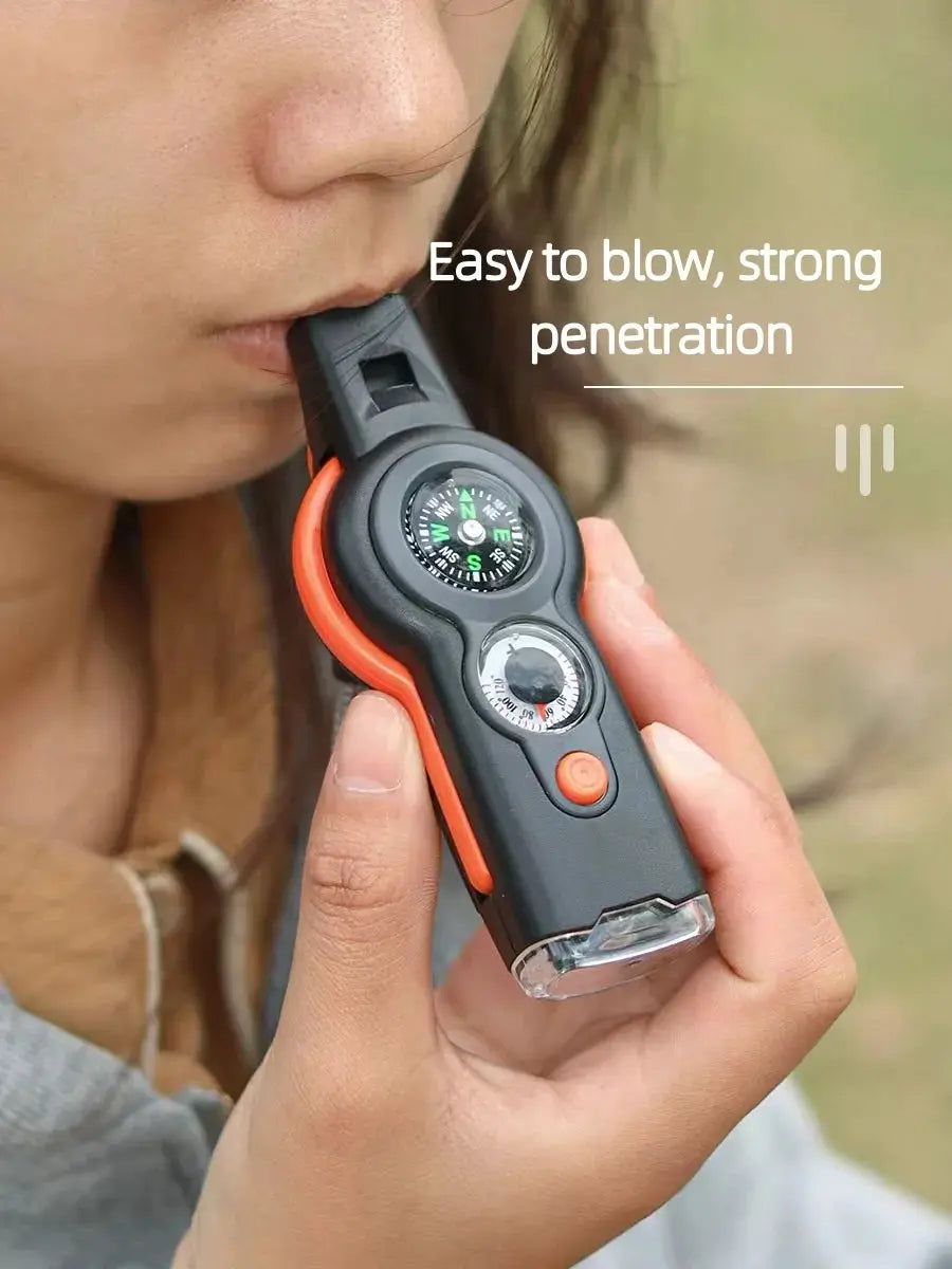 Simples Market 7-in-1 outdoor survival whistle with compass, black and orange