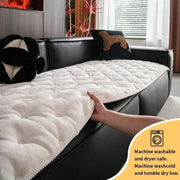 Sofa cushion in light cream flannel with straight-row quilting, anti-slip; machine washable.