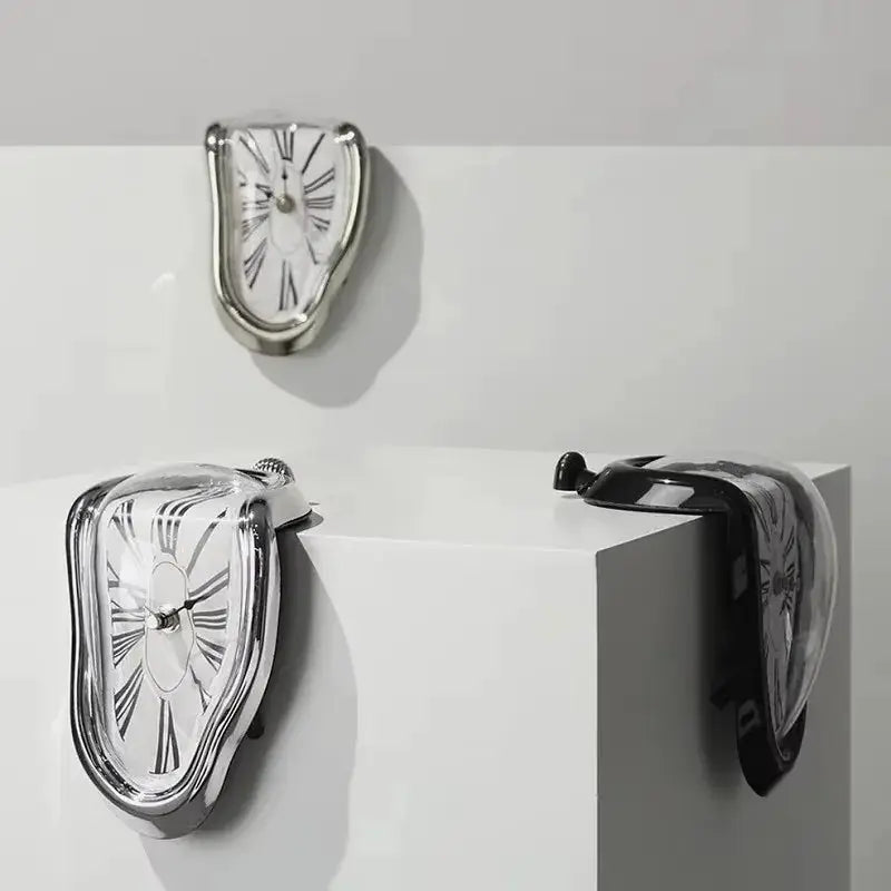 Simples Market surreal melting clock set — 3 melted Roman numeral wall clocks in silver finish.