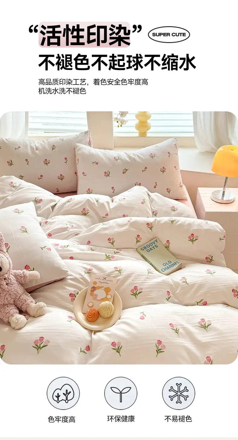 Tulip three-piece student bedding set by Simples Market with white quilt cover and pink tulip print pillowcases