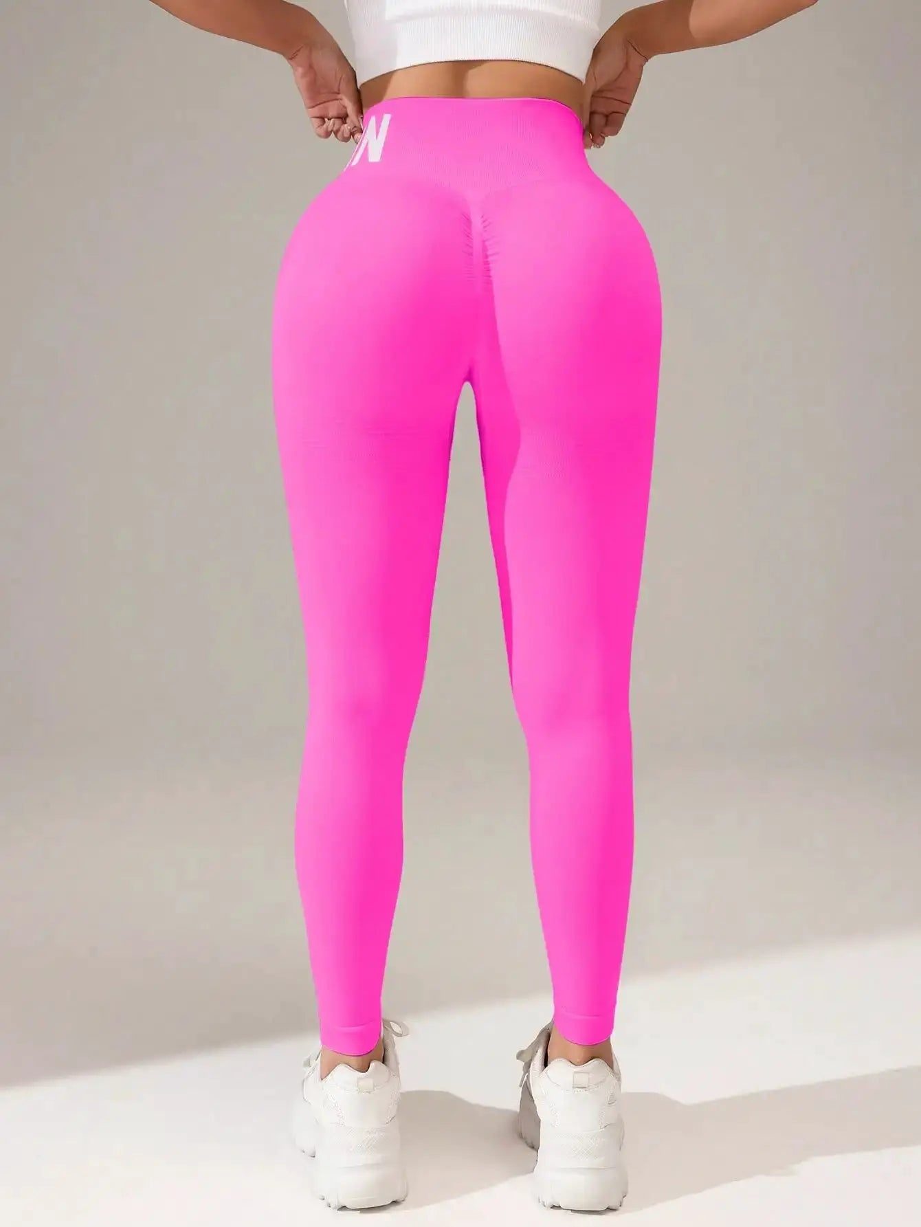 European and American seamless yoga leggings with high waistband, butt-lifting, quick-dry breathable pink tights.
