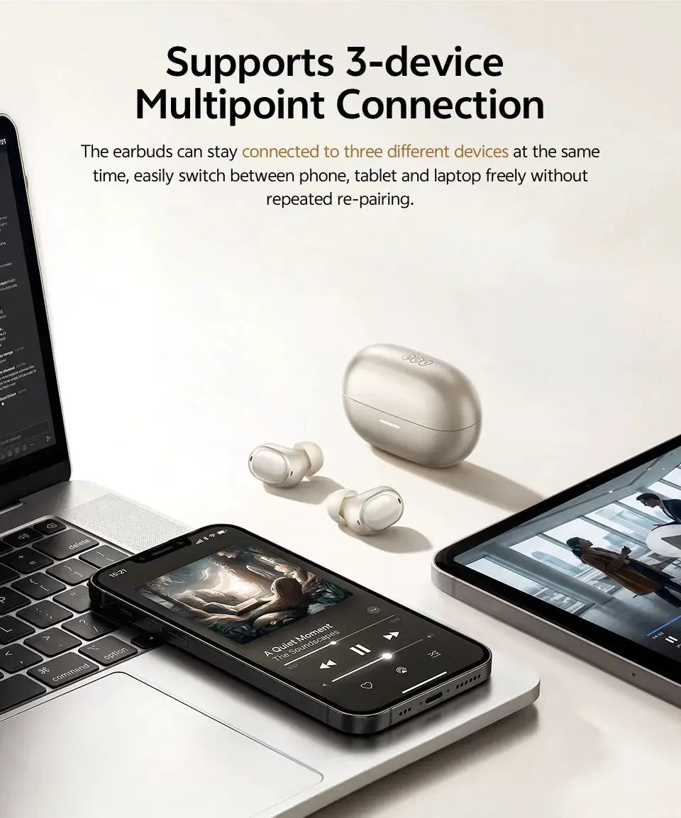 QCY MeloBuds A30 wireless earbuds with white charging case; two earbuds shown beside a laptop and tablet