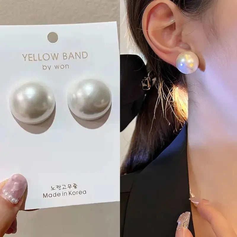 Pearl stud earrings, 2.0cm imitation round pearls, white; shown on Yellow Band by Won card