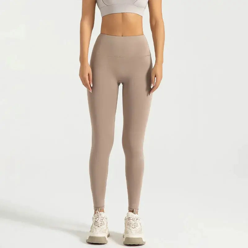 Leggings for women in nude, high-waisted yoga pants with abdominal compression