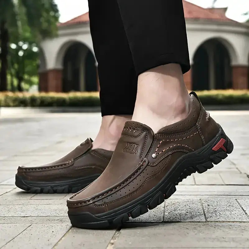 Handmade brown leather men’s loafers with slip-on moccasin styling and rugged outsole by Simples Market