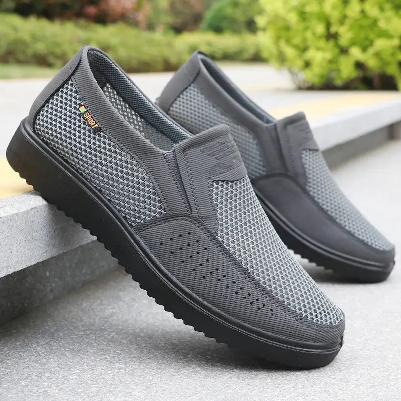 Simples Market men's breathable slip-on casual shoes, gray mesh upper with black rubber sole, pair.