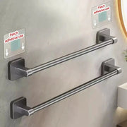 Towel bar set with two brushed-nickel, no-drill wall-mounted bars using adhesive patches by Simples Market