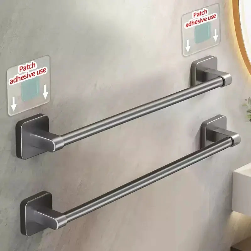 Towel bar set with two brushed-nickel, no-drill wall-mounted bars using adhesive patches by Simples Market
