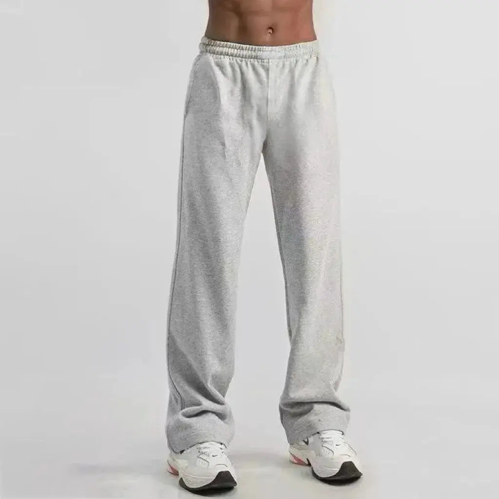Men's grey straight-leg sweatpants with elastic waistband, relaxed fit, Y2K retro-style