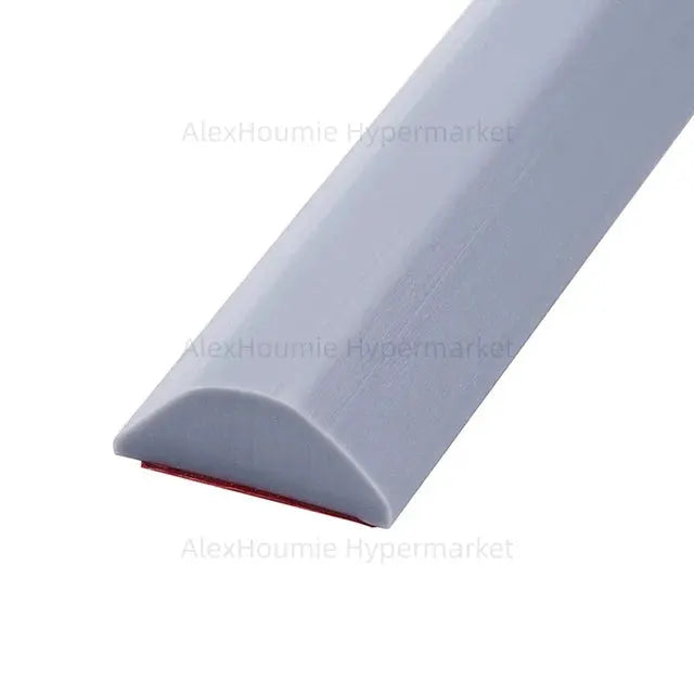Collapsible shower water dam threshold barrier in gray plastic by Simples Market