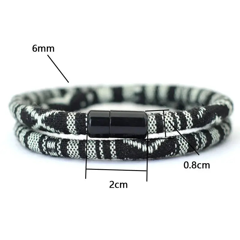 Men's bohemian rope bracelet with black magnetic clasp and black-white striped weave