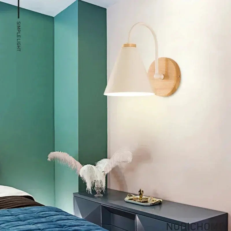 Nordic wall sconce light fixture with white conical shade and wooden backplate