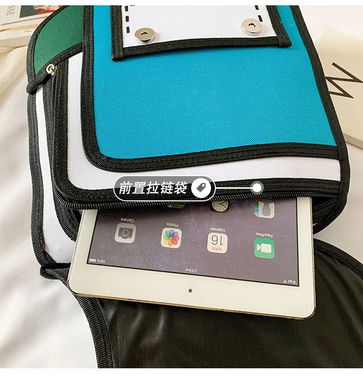 Simples Market children's backpack in turquoise blue and gray with a front zip pocket and a tablet tucked inside