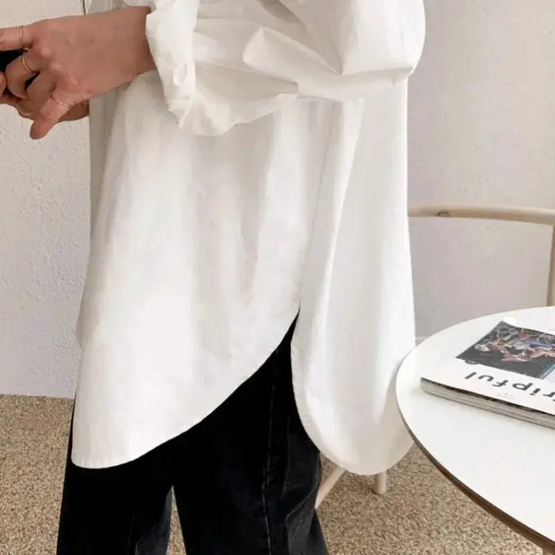 Office Lady white cotton long-sleeve blouse with turn-down collar and curved hem