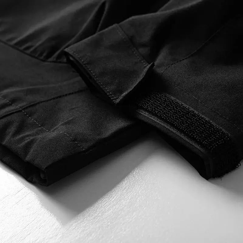 JNLN unisex black waterproof windbreaker sleeve with Velcro cuff strap by Simples Market.