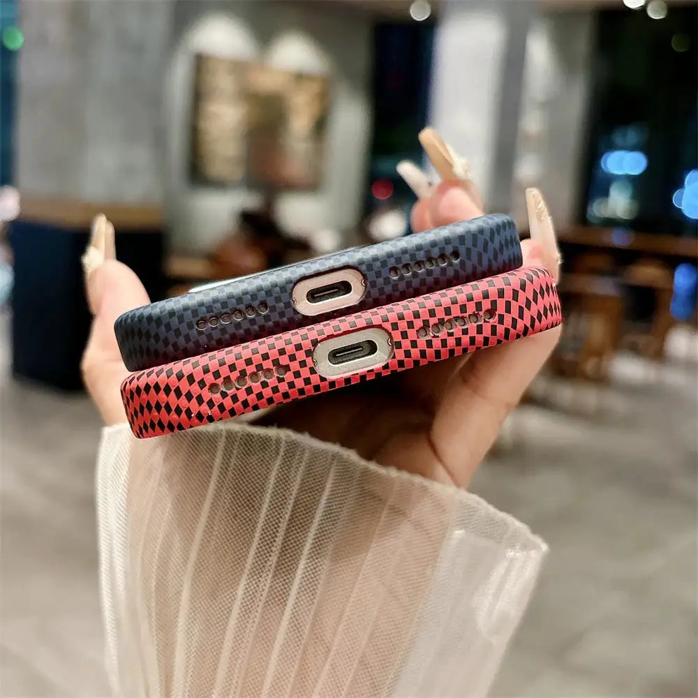 Pair of Simples Market carbon fiber iPhone 17 Pro Max cases in black-blue and pink-red checker, ultrathin.