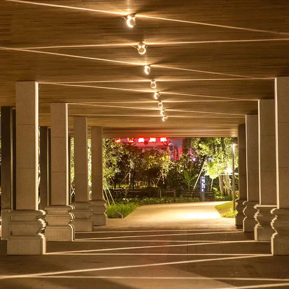 9W LED Cob lamp; rotatable, narrow-beam wall/door-frame lighting with white/black shell along a columned corridor.