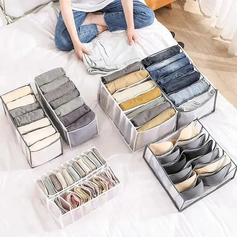 Closet organizer set by Simples Market for underwear and socks; foldable gray fabric boxes with compartments