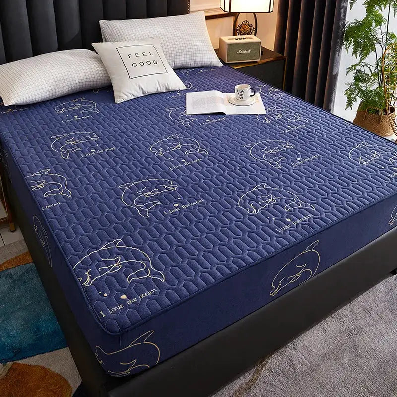 Waterproof quilted mattress protector by Simples Market in navy, fitted sheet-style 150/160/180x200